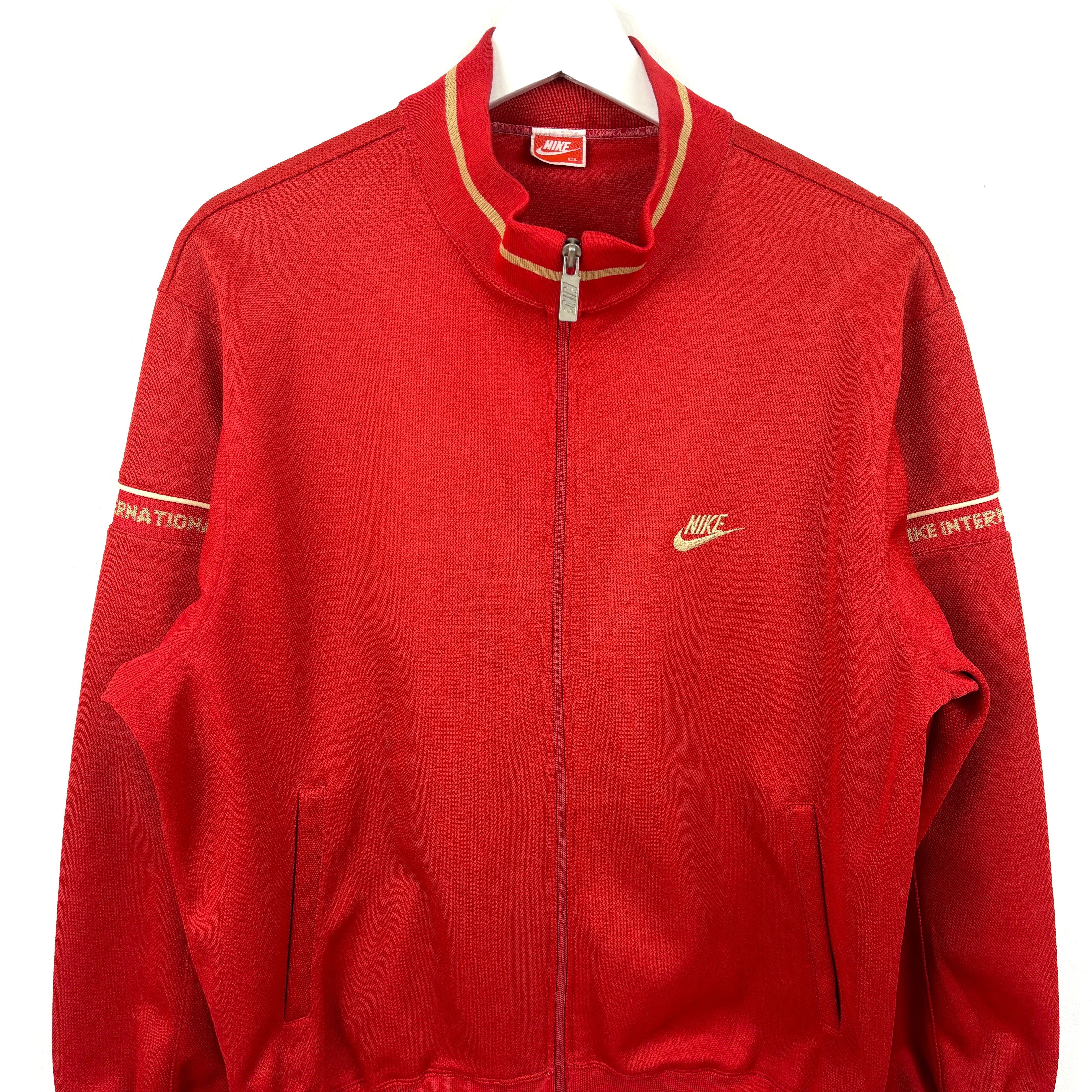 NIKE Track Jacket red goldline.