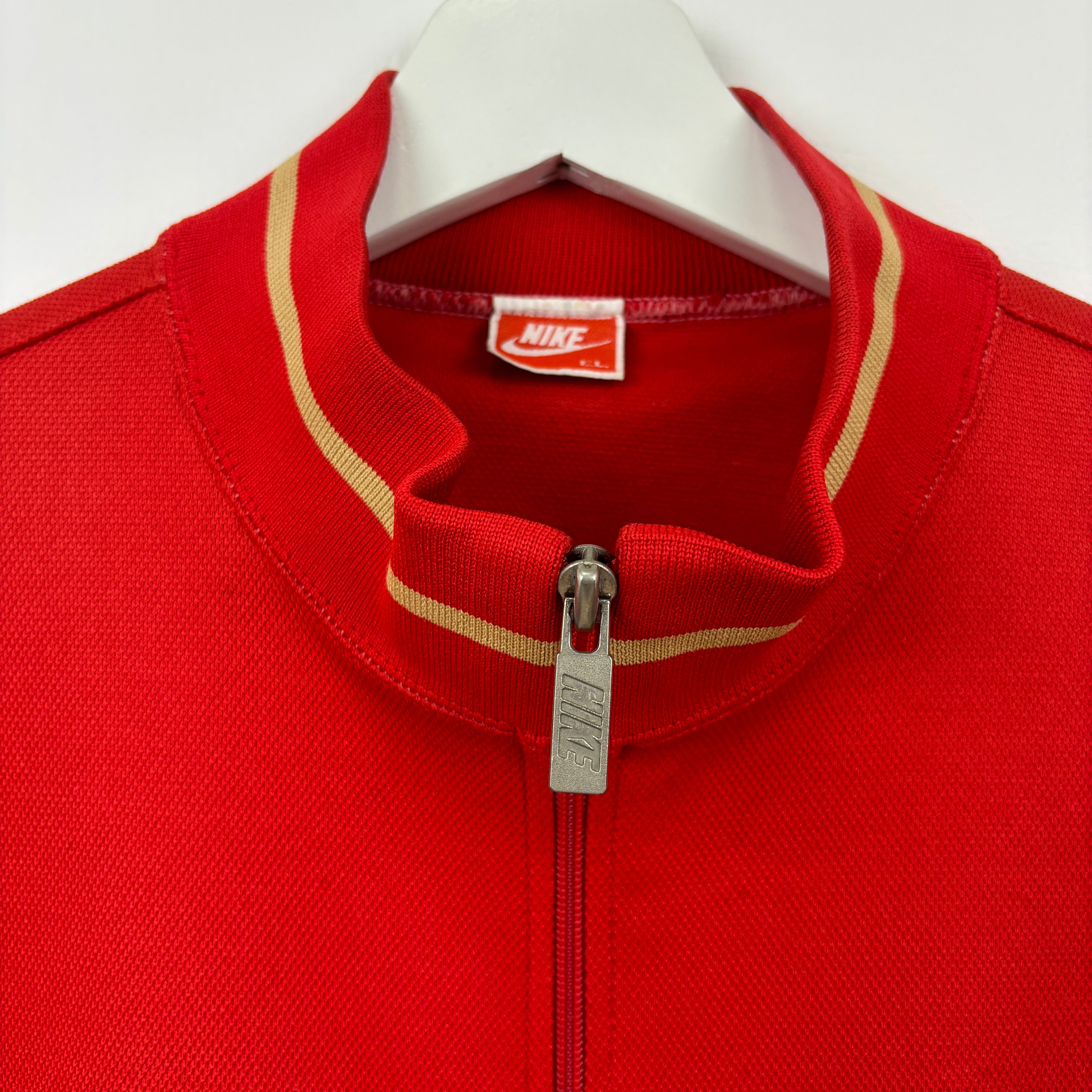 NIKE Track Jacket red goldline.