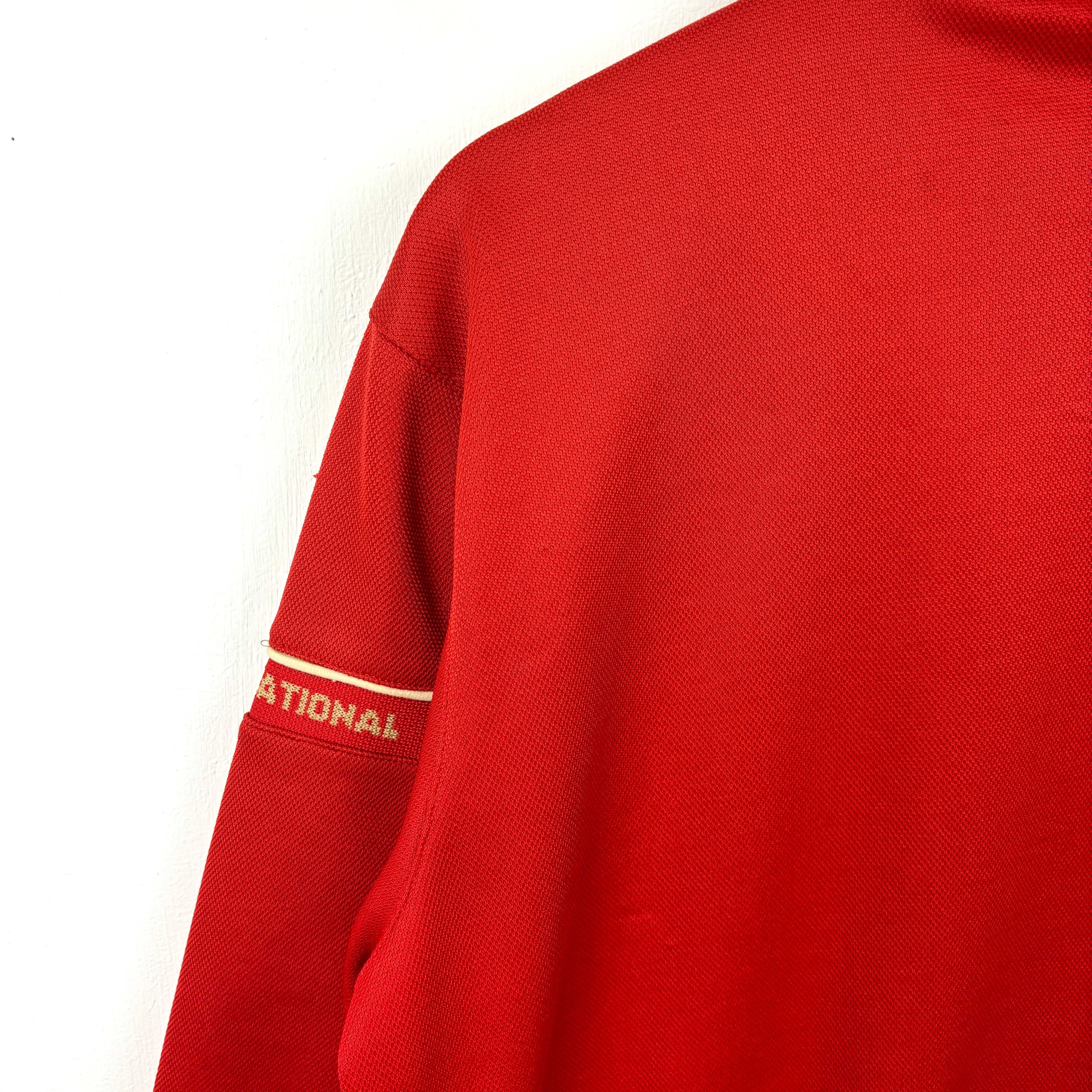 NIKE Track Jacket red goldline.